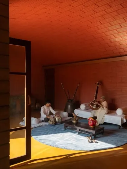 I design spaces for living and gathering. This room, with its Jaisalmer stone floor and terracotta vault, is perfect for music sessions and intimate conversations.