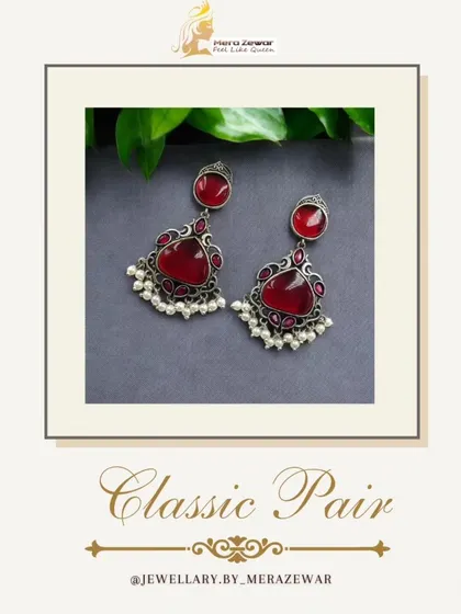 This version of the classic dangle earrings comes in a deep red. It's a passionate and bold color, perfect for making a confident style statement.