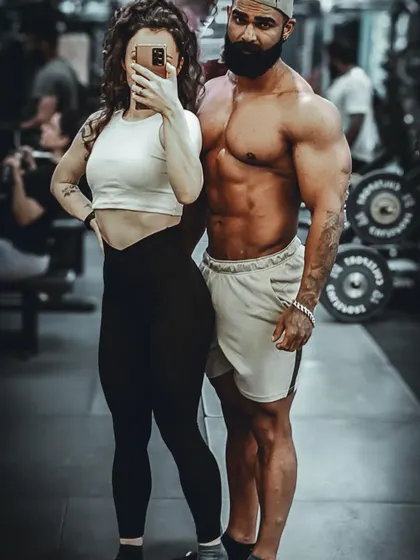 With my partner. Having a strong support system is crucial in a sport that demands so much. We share a passion for the fitness lifestyle.