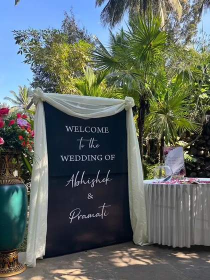 Another view of the elegant welcome area, set against the natural beauty of a waterfall.