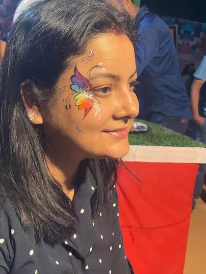 A vibrant rainbow butterfly, one of our most cheerful and colorful designs. It's guaranteed to make you smile.