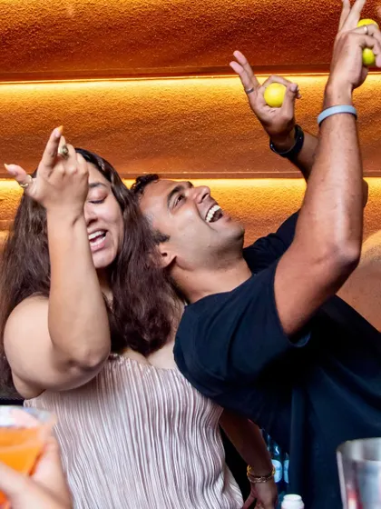 Pure, unadulterated fun. Guests laughing and enjoying the interactive elements of the night, like our impromptu bar takeovers.