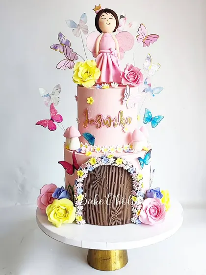 Another view of the enchanting fairy garden cake. My cakes may look like they are covered in fondant, but it's actually a super tasty and stable colored ganache.