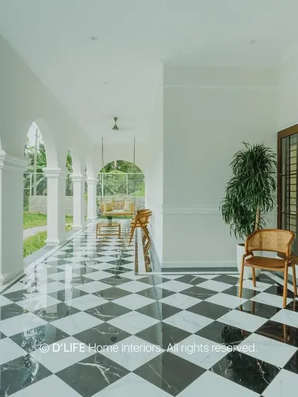 Welcome to a home where timeless elegance meets modern comfort. This beautiful arched veranda with classic checkered flooring opens into a space designed for serenity and style, showcasing our ability to blend classic and contemporary architecture.