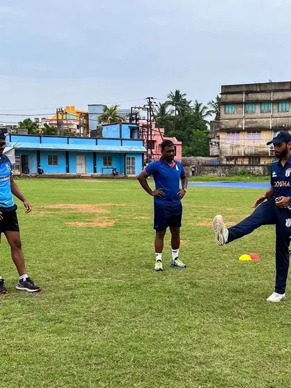 A light-hearted moment during a warm-up. Building a positive and enjoyable training environment is key to long-term success and consistency.