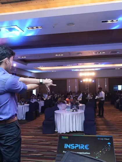 Addressing the audience at the Google Cloud event. My goal is to command the room's attention and draw them into a shared experience, making them active participants rather than just spectators.