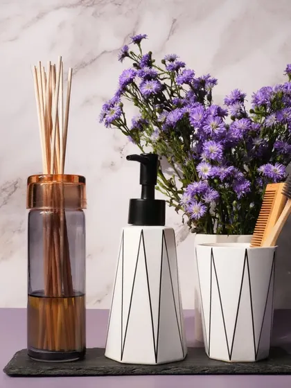 Our reed diffusers, shown here in a modern bathroom, provide a lasting aroma for up to 3 months. Once the oil is finished, simply order a refill to reuse the exquisite handmade glass container.