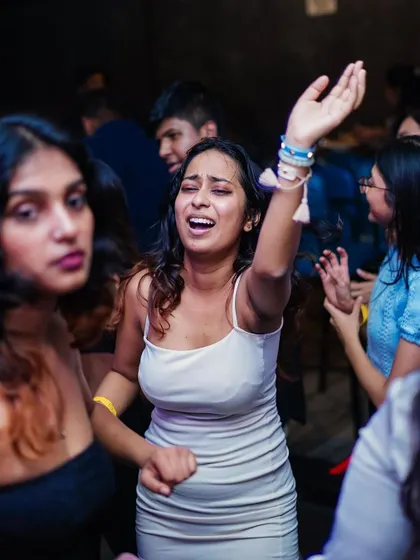 A guest completely lost in the music on the dance floor. Seeing reactions like this is how I measure the success of a night.