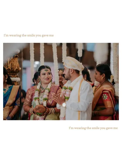 "I'm wearing the smile you gave me." A candid moment of shared happiness between the bride and groom during their wedding ceremony.