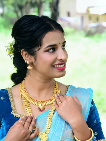 A beautiful look for a photoshoot or special event. The light blue saree is paired with a royal blue velvet blouse, and the drape is kept simple and elegant to highlight the color combination.