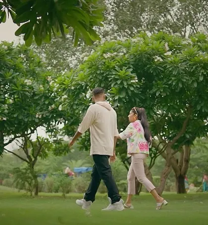 A touching scene from the 'Pehle' music video, showing a walk in the park. This still represents a simpler, happier time in the song's narrative.