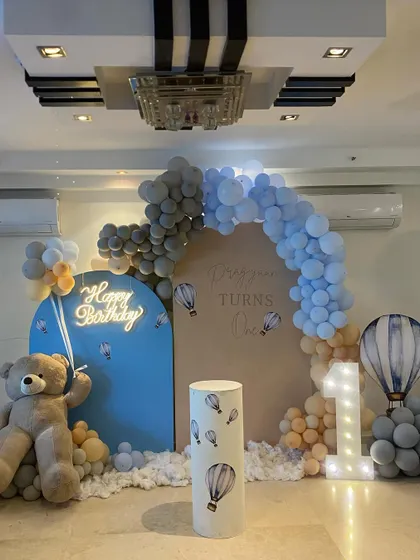 The complete setup for this hot air balloon themed first birthday, showing how all the elements come together in a home setting to create a magical party space.