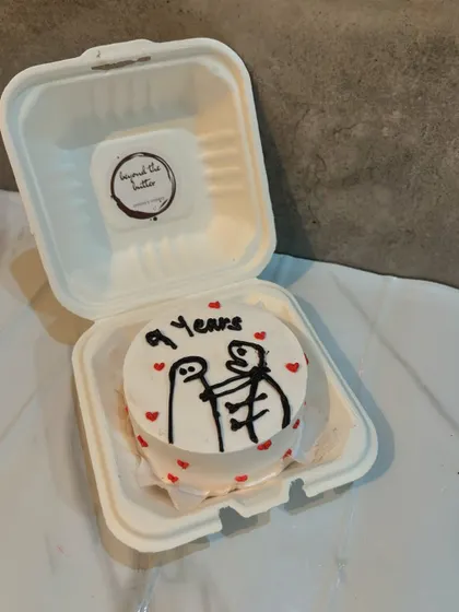 A funny and cute bento cake celebrating 9 years together.