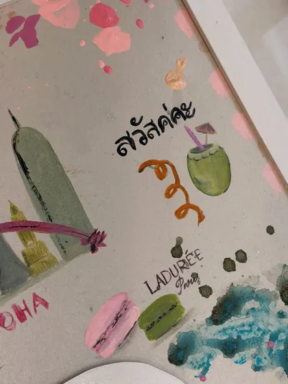 Details from a trip to Paris and Thailand, complete with macarons from Ladurée and a refreshing coconut drink. These tiny painted memories are what make a custom travel story canvas so special.