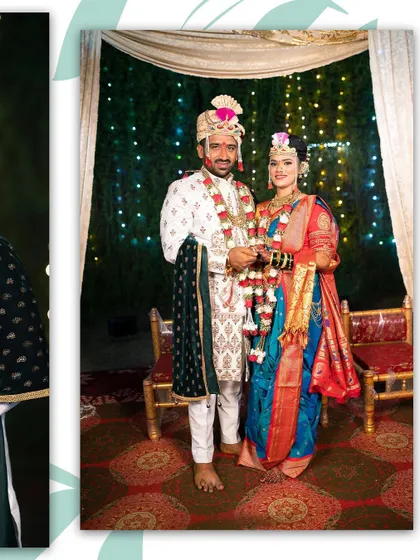 A full-length portrait of the bride and groom in their traditional Maharashtrian wedding outfits, standing together under the lights of the mandap.