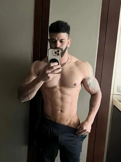 Even while traveling for business, I stick to the plan. This physique is maintained with consistent 40-minute workouts, proving you can stay fit even with a busy schedule.