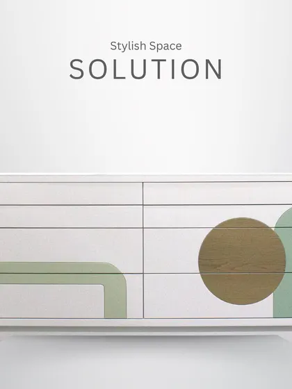 This stylish storage unit is a perfect example of functional art. The clean white frame is adorned with a playful geometric pattern in shades of green and wood veneer, offering ample storage with a creative twist.