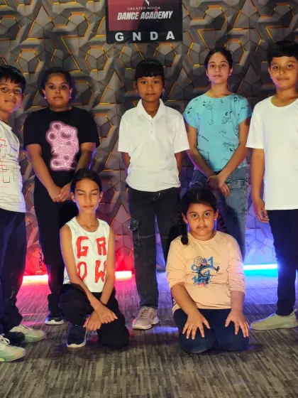 A group of our dedicated young dancers, ready to start their next routine.