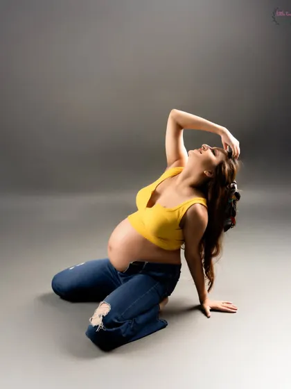 A more dynamic pose from the same casual shoot, capturing a moment of joy and freedom.