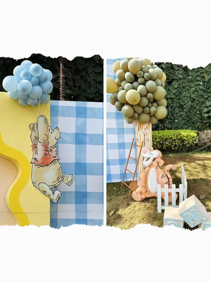 A duplicate image showing the charming Pooh and Tigger cutouts that are central to our Hundred Acre Wood theme.