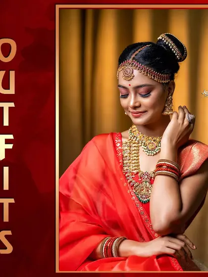 A portrait from a couple's photoshoot, highlighting the bride's beautiful red and cream half saree and traditional jewelry.