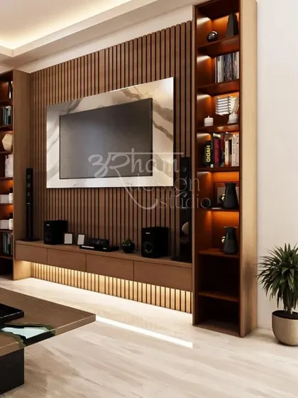 A closer look at the custom TV unit from our Lajpat Nagar project. The combination of fluted wood panels, integrated shelving, and warm backlighting creates a functional and visually stunning focal point for the living area.