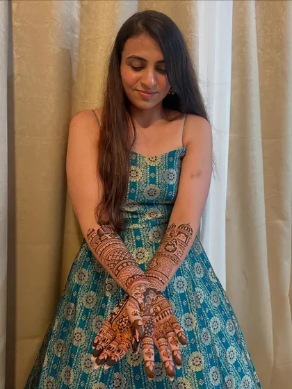 The beautiful bride Shivani, looking elegant and happy with her personalized bridal mehendi.