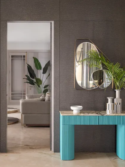 A view through one of the hidden doors, revealing the living room beyond. This shot demonstrates how we use concealed elements to create a sense of intrigue and seamlessness.
