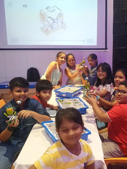 Another happy group of young roboticists, celebrating the completion of their projects at our summer camp.