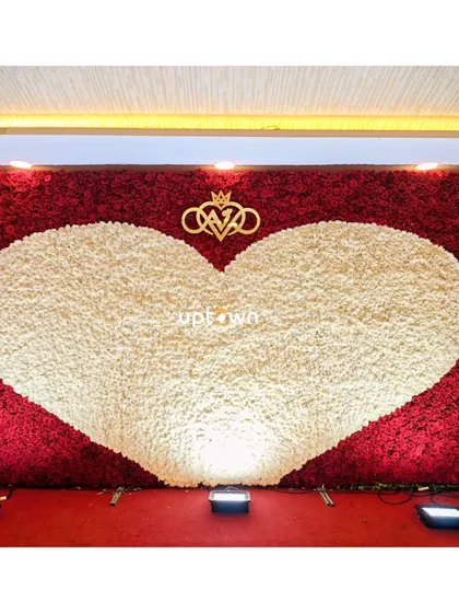 The full view of the heart-shaped floral wall.