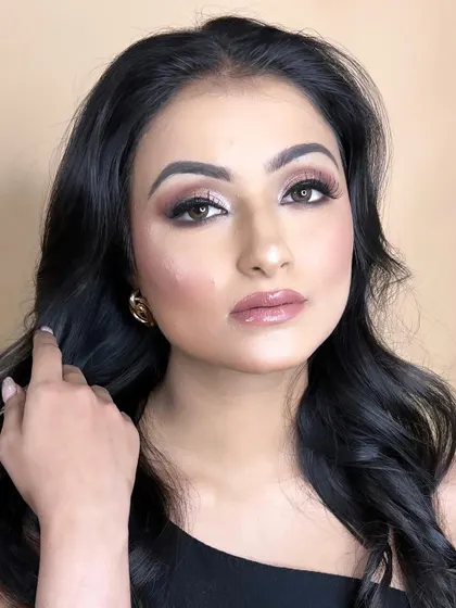 A close-up of the finished look from the transformation video, showcasing the dewy skin and beautifully blended eyeshadow.