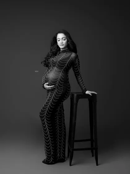 Another example of how black and white can transform a shot, this image feels quiet and contemplative, drawing full attention to the mother's connection with her baby.