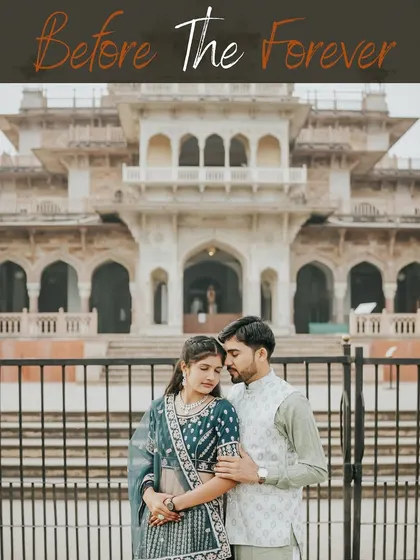 A classic portrait of a couple in traditional Indian attire, embracing before the gates of a Jaipur heritage site. This shot captures a sense of timeless romance.
