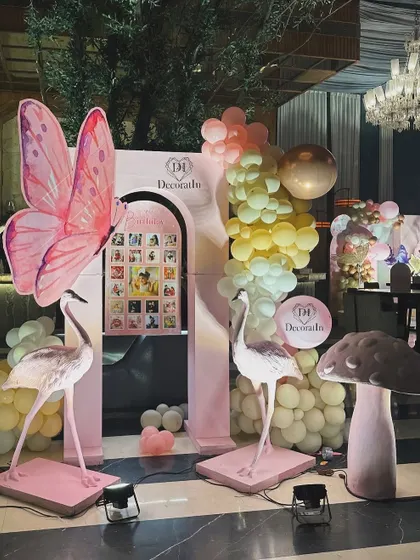 Another view of the memory lane setup, showing the arrangement of props and the balloon column.
