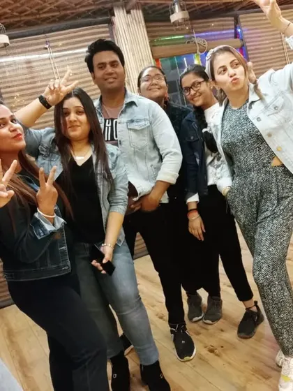More fun poses from our denim day. It's these fun, informal moments that build our strong community.