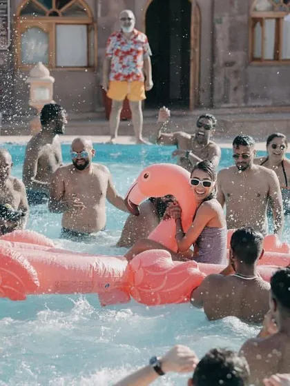 A destination wedding is also a vacation for your guests. This pool party at Khimsar Fort was the perfect way for everyone to relax, celebrate, and create fun memories together in the sun.