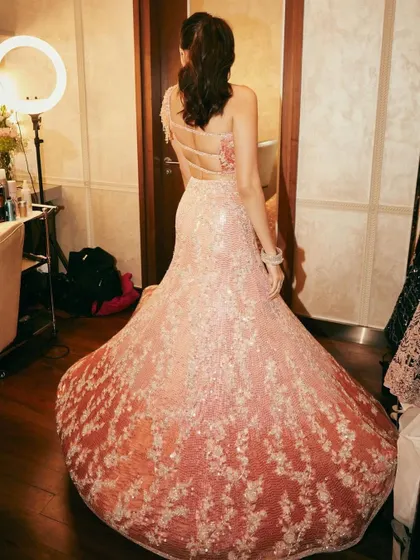 The full view of the iconic sangeet look. The way the lehenga catches the light is just incredible, making it perfect for a night of dancing and celebration.
