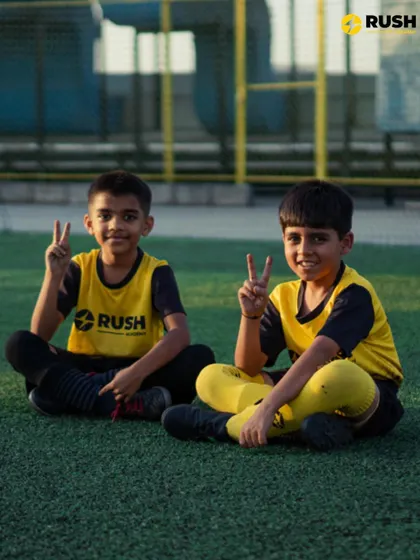 Friends on and off the field. These two players showcase the camaraderie that is a hallmark of the Rush community.