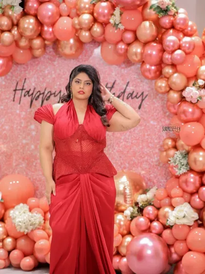 The birthday girl looking radiant against her shimmery rose gold balloon arch. We love creating these full, glamorous backdrops that make the person of honor the absolute center of attention.