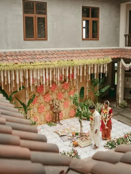A traditional Chettinad house offers a story in every corner. We designed this courtyard wedding to honor its cultural beauty, using classic flower arrangements and brass elements to create an authentic and intimate ceremony space.