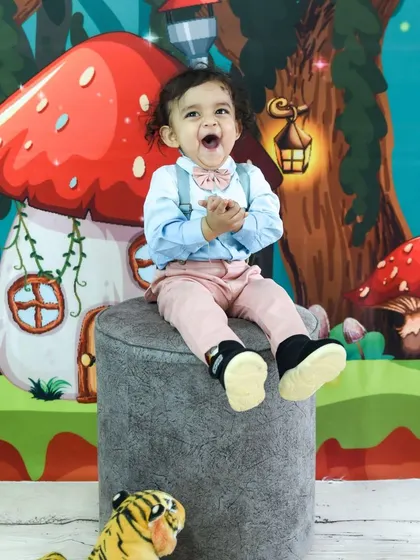 A moment of pure excitement. We love capturing the unfiltered joy of children, especially on their birthday.