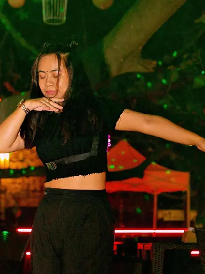 Lost in the rhythm under the banyan tree. The intimate setup at Pebble for JUICEY Fridays creates a unique and immersive experience.