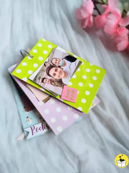 A stack of colorful mini ring flip books, showing the different designs available.