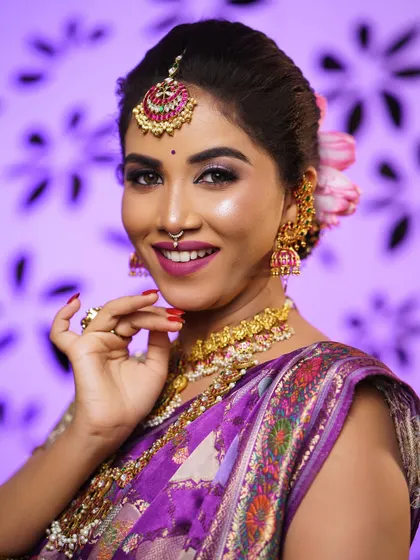 A bright and cheerful portrait. The makeup is designed to look great in photos and make the bride feel radiant and happy.