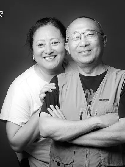 A joyful black and white portrait of a couple. The word "F.O.R.E.V.E.R" adds a sweet, sentimental touch.