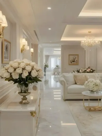 Another view of a luxurious, all-white living space. Contact us to get a quote for your home.