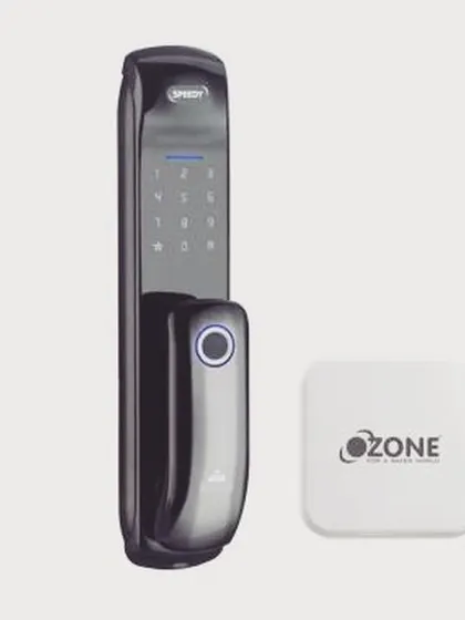 The UNIQ smart door lock with its accompanying Wi-Fi gateway module. This setup enables advanced features like timed passwords and remote access control.