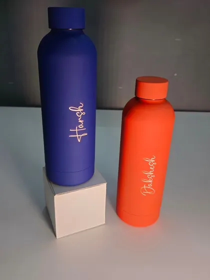 The Quench bottle is also available in vibrant colors like this blue and orange. It features a rubberized matte finish for a secure grip and keeps drinks hot or cold for up to 6 hours.