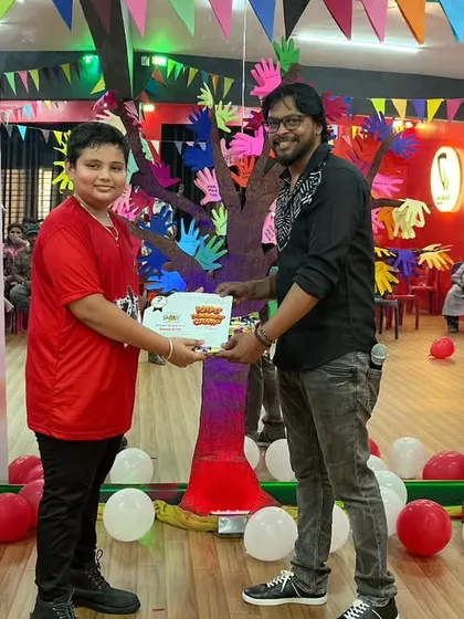 A big smile from this camper as he accepts his certificate. We make sure every child gets their moment in the spotlight.