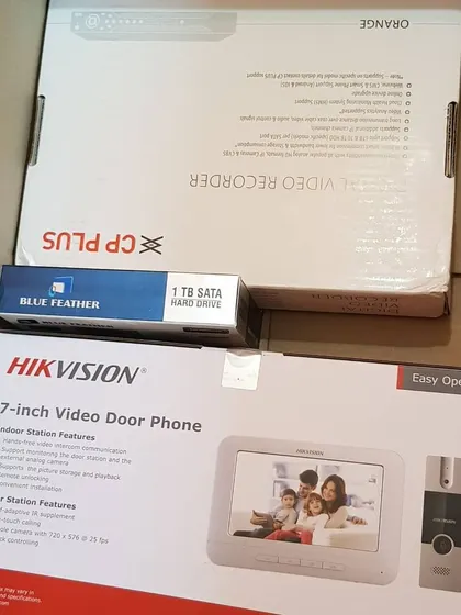 I create custom security packages. This one includes a Hikvision video door phone, a CP Plus DVR, and a hard drive for storage.